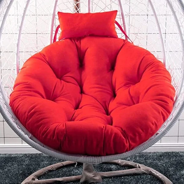 Red round cushion for balcony swing chair, microfiber filled, soft and durable for outdoor and indoor use – chair not included.