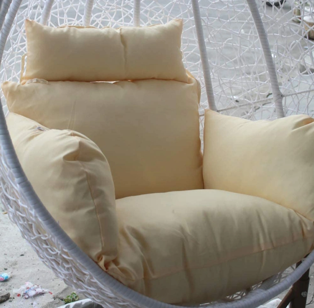 Soft off-white cream cushion for swing chair, adding elegance and comfort to indoor or outdoor seating