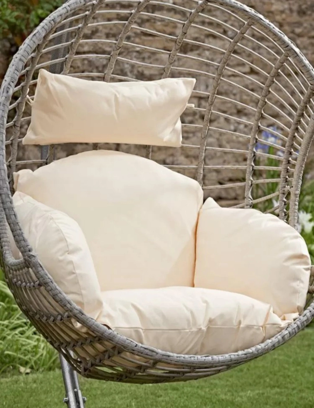 Soft off-white cream cushion for swing chair, adding elegance and comfort to indoor or outdoor seating